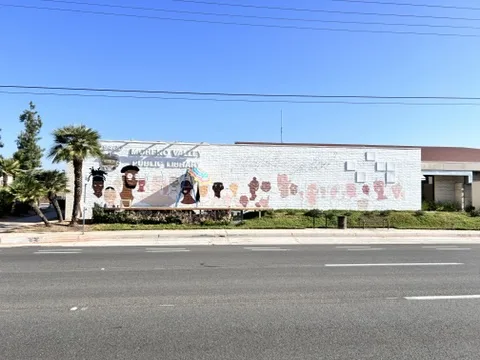 Another view of the MoVal Reads! mural along the library wall