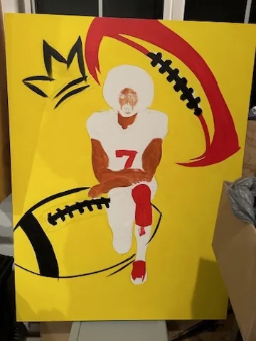Acrylic painting of Colin Kaepernick kneeling on a football against a bright yellow ground