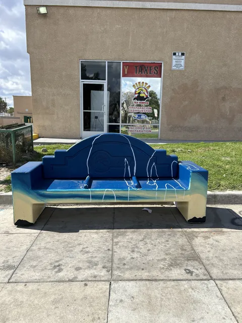 Back of the painted Colton bench on the sidewalk