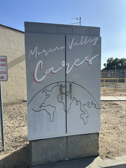 Moreno Valley Cares utility box with a line drawing of the globe