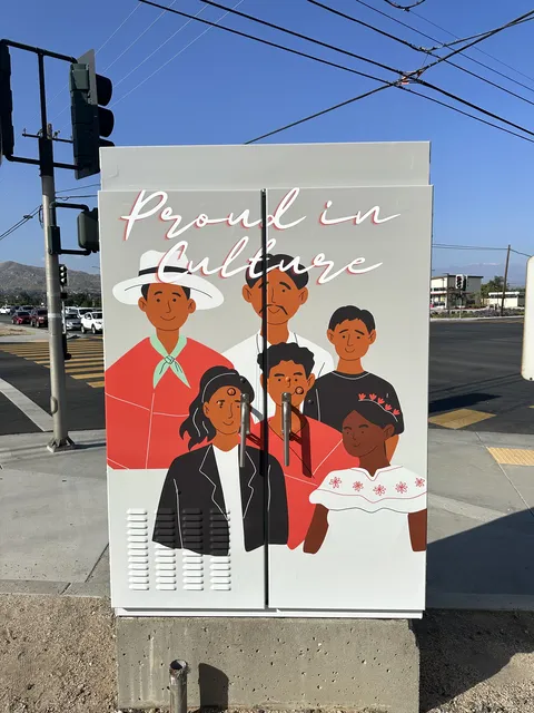 Proud in Culture utility box with a family in red